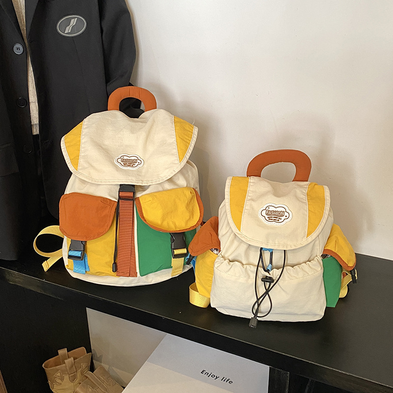 한국판 도파민 대비 색상 여성용 배낭 인터넷 연예인 스타일 졸라매는 끈 여행 경량 학생 학교 가방 새로운 배낭