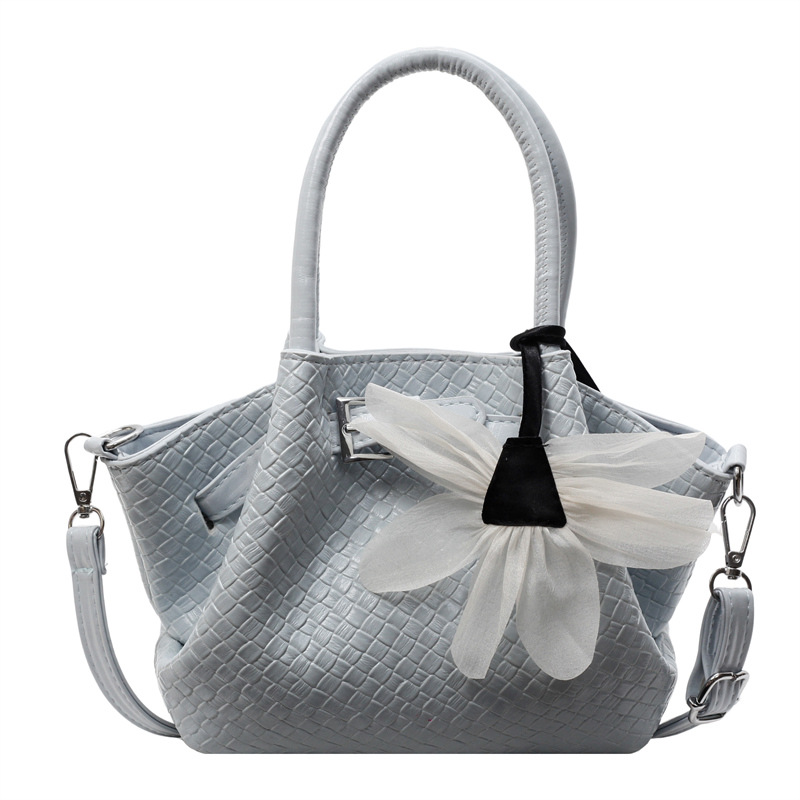 Bolso de cubo de mano de tendencia de nicho para mujer 2025 nuevo bolso de hombro de moda de viaje de trabajo bolso de mensajero de estilo occidental de todo fósforo