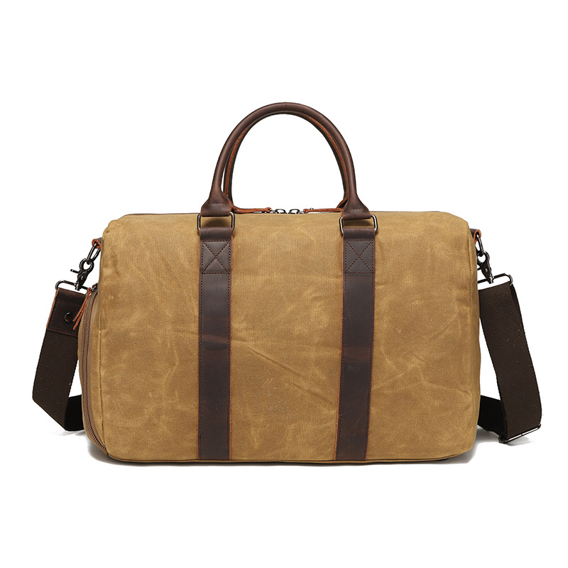 Nueva bolsa de viaje de tela de cera de aceite resistente al desgaste retro europea y americana color sólido bolsa de hombro al aire libre bolsa de almacenamiento al por mayor