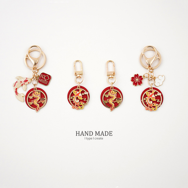 Tianyun Tengfei Dragon y Phoenix año llavero creativo lindo hombres y mujeres coche llavero aleación exquisita joyería en línea celebridad colgante