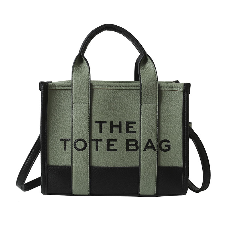 Bolso tote de comercio exterior para mujer 2023, nuevo bolso de mano moderno europeo y americano, bolso bandolera con estampado de letras y bloques de color.