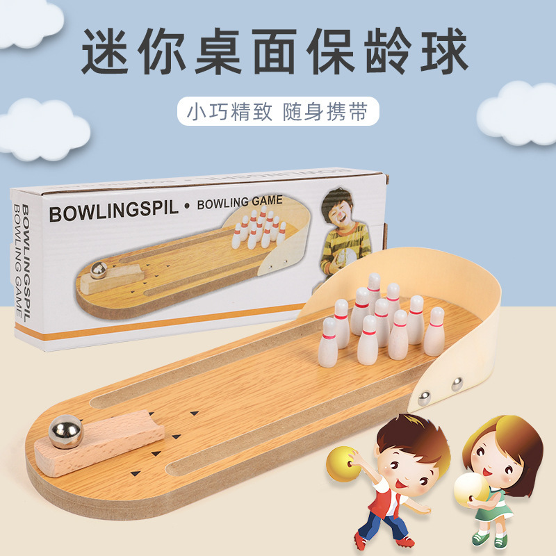 Los fabricantes de juguetes para niños venden al por mayor mini bolos de madera para aumentar la interacción entre padres e hijos de escritorio juguetes educativos para niños