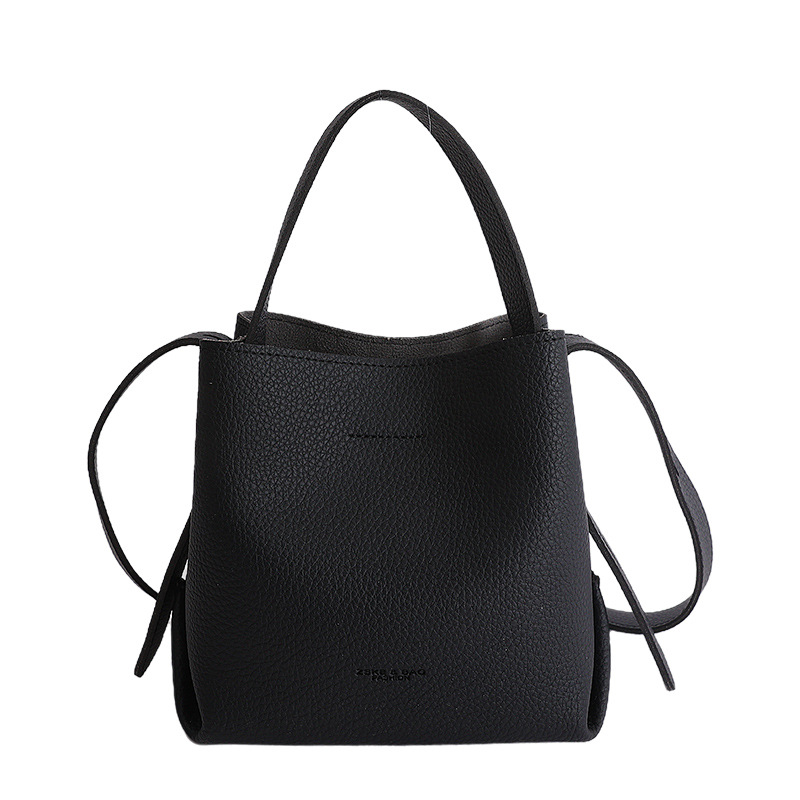 Bolsa de cubo de mano coreana 2026 nuevo nicho diario bolso de cubo bolso de mujer gran capacidad de transporte de viaje mochila