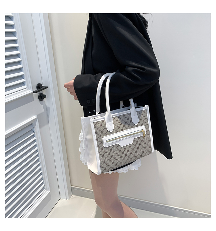 Small niche design, beautiful and personalized handbag for women 2024 new fashionable splicing trend, large capacity_voghion.com