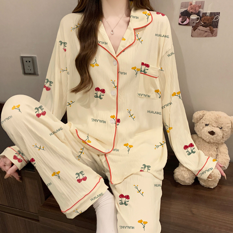 蝶結びのさくらんぼのプリントの女性のパジャマの春と秋の新型のカーディガンの長袖のズボンの部屋の服のスーツは実際に卸売りをたたきます。|undefined