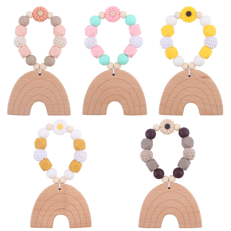 Nuevo bebé suministros dibujos animados Arco Iris haya mordedor creativo DIY bebé mordedura teether pulsera juguete