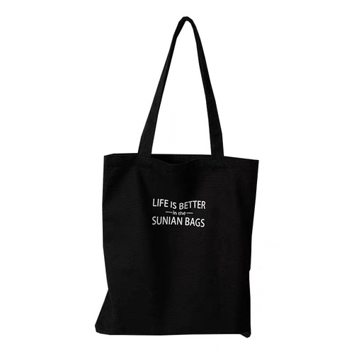 Large-capacity one-shoulder canvas bag with literary letters for male and female students attending class portable school bag Korean style niche design