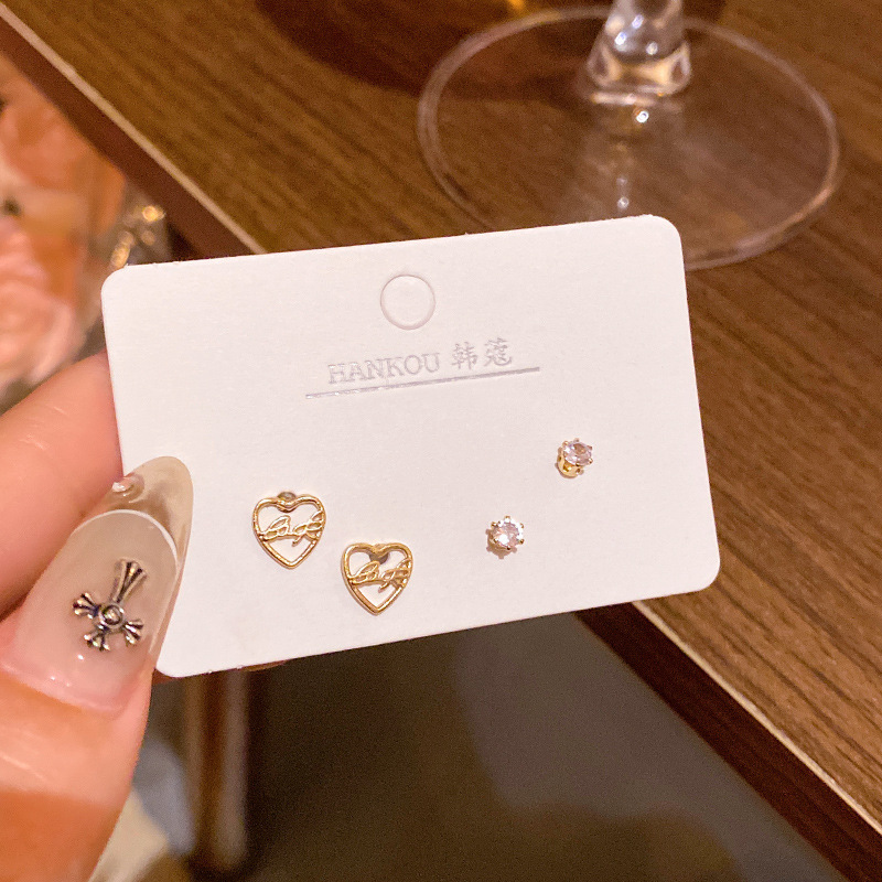 S925 aguja de plata exquisito ZIRCON oído-aumento traje pequeño oído espárragos Luz de lujo nicho versátil temperamento perla pendientes femeninos