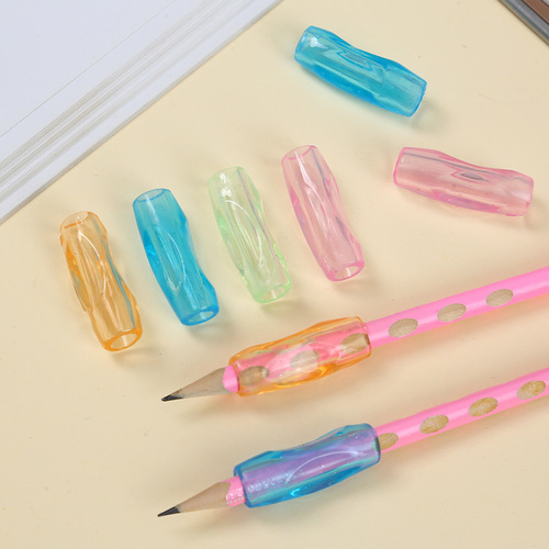 Children's new pen holder corrects writing posture, student and toddler pen holding sheath, candy-colored silicone pen holder