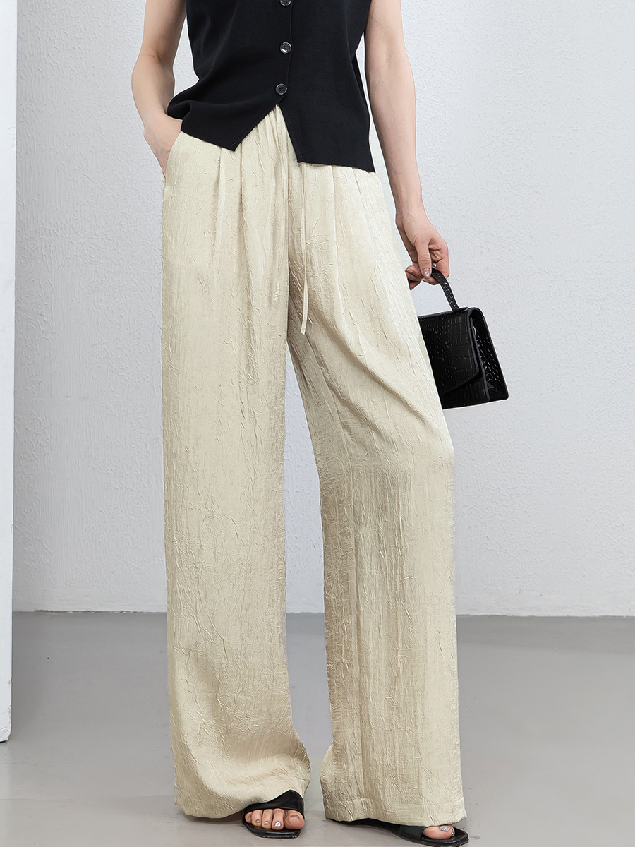Quần culottes nữ ống rộng chất liệu mềm mại, cạp chun, dáng suông rủ nhẹ — màu trắng ngà