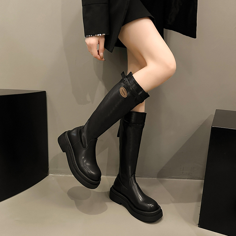 フランスの白いブーツの女性は膝の厚い底のファッション靴のカジュアルなブーツの後でファスナーの長靴の現物の卸売りをします。