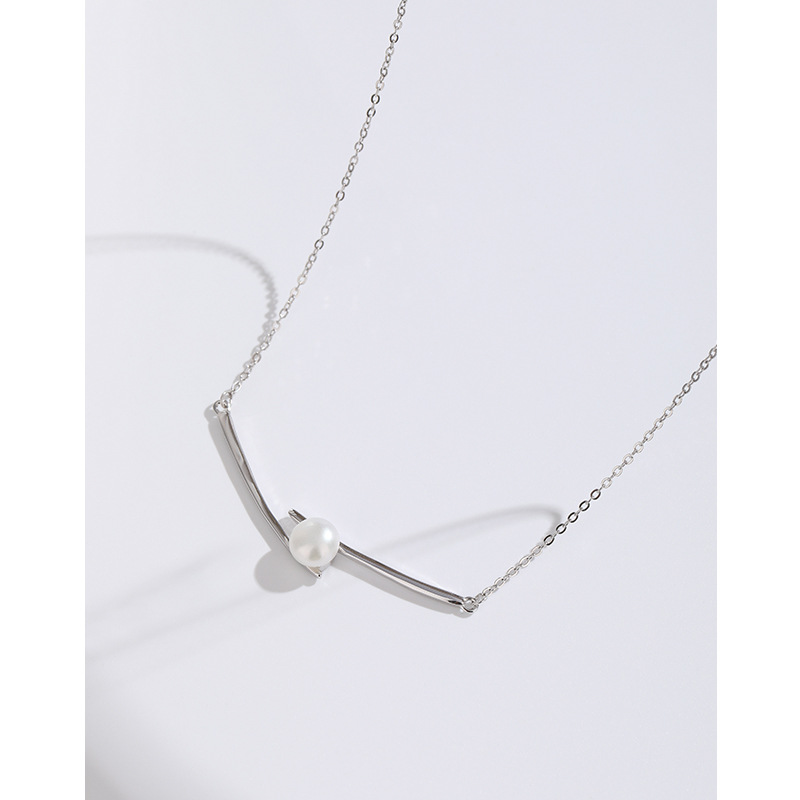S925 plata esterlina collar de perlas de agua dulce hembra nicho diseño palillos colgante de luz de lujo de alto grado todo partido cadena de la clavícula