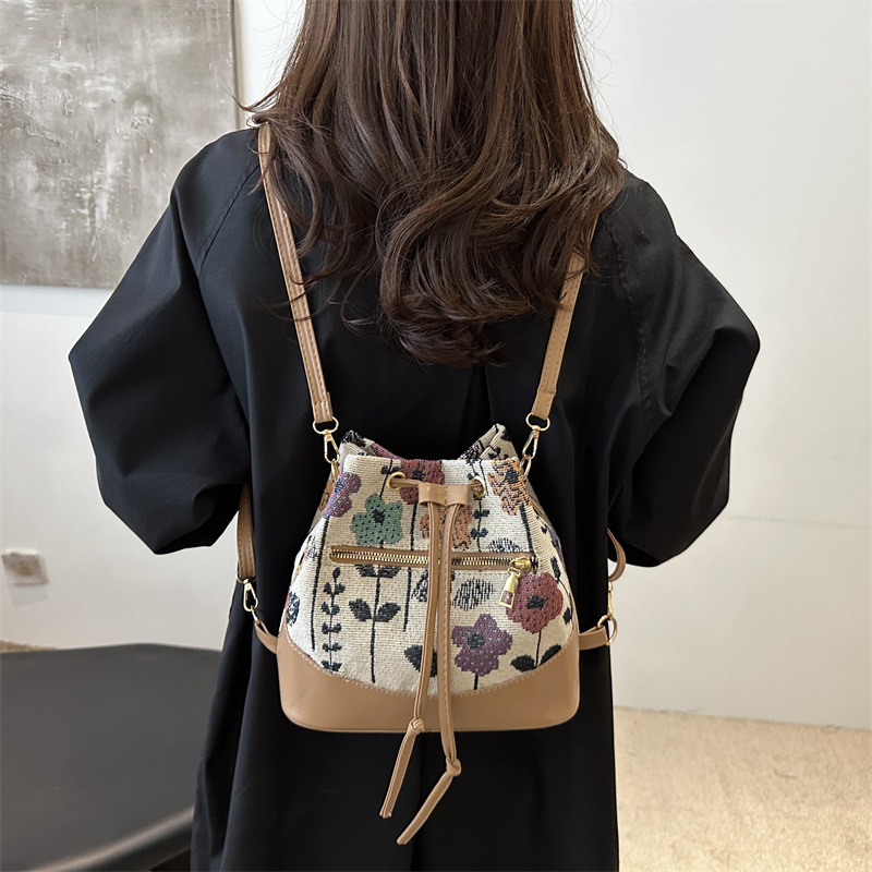 Bolsa de mochila de estilo nacional para mujeres 2024 nuevo bolso de moda para teléfonos móviles de verano ocio retro bolso de cubo de cuerda