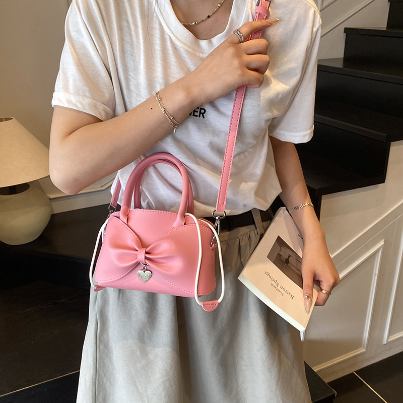 Bolso de moda coreano 2025 verano nuevo bolso femenino diseño de nicho bolso de hombro lindo lazo bolso de mensajero