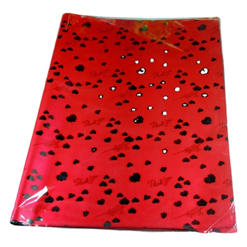 [Ventas de fábrica] suministro de película de aluminio papel de regalo transparente embalaje de regalo láser película de aluminio flor papel de regalo