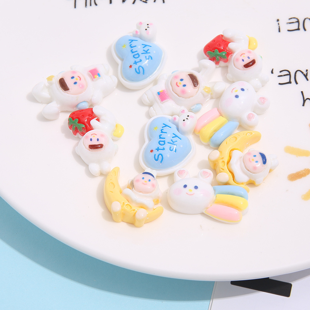 Nueva historieta brillante figura espacio resina accesorios DIY estrellado conejo teléfono caso accesorios de pelo zapato hebilla material hecho a mano al por mayor