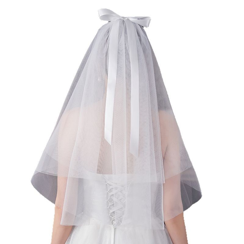Short wedding dress with bow