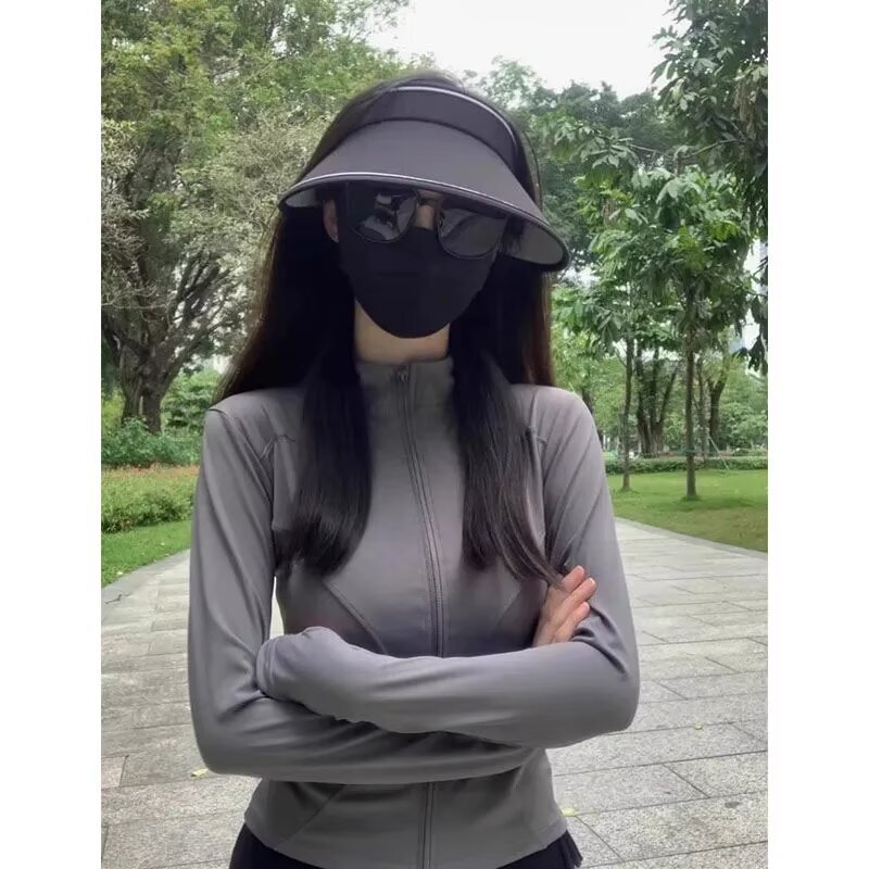 大きいサイズのスポーツの日焼け止めの長袖のショートコートの女性の夏の修身はやせている純色を現します。|undefined
