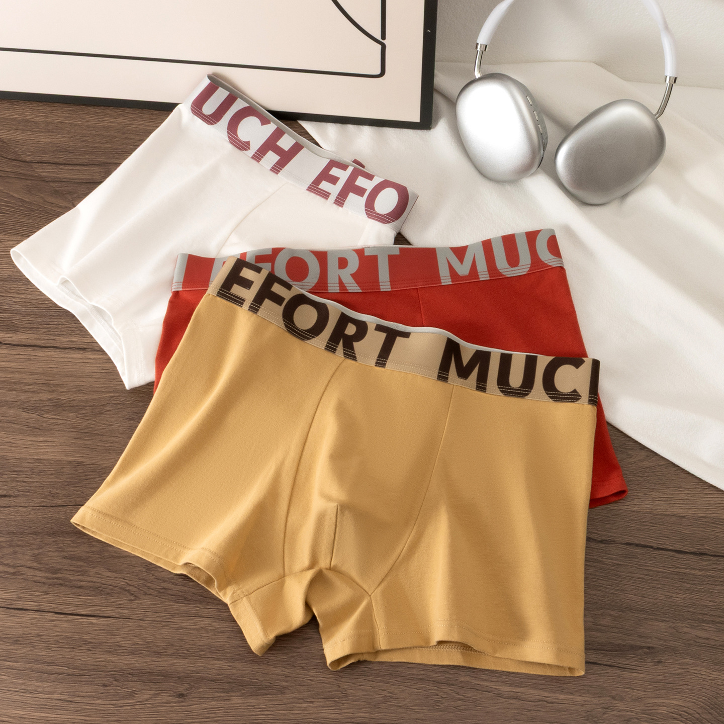 Ropa interior de hombre de algodón de nuevo estilo, antibacteriano y transpirable, calzoncillos con letras personalizadas, calzoncillos bóxer de hombre de tendencia de cintura media al por mayor