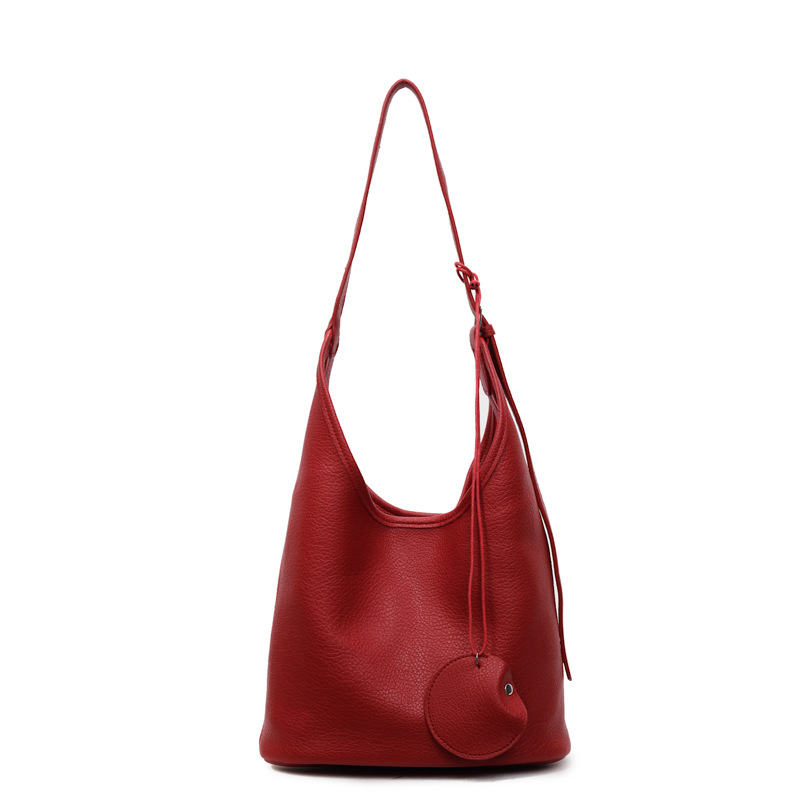 Bolso retro transfronterizo de alta calidad bolso de cubo de agua mujer otoño y invierno 2025 nuevo tipo de bolso de brazo de viaje bolso de hombro universal