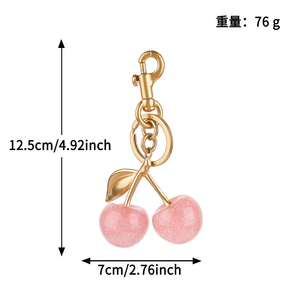 Transfronterizos directamente para bolsas de cereza colgantes de moda llaveras de automóviles llaveras de Amazon llaveras de metal accesorios de bolsas al por mayor