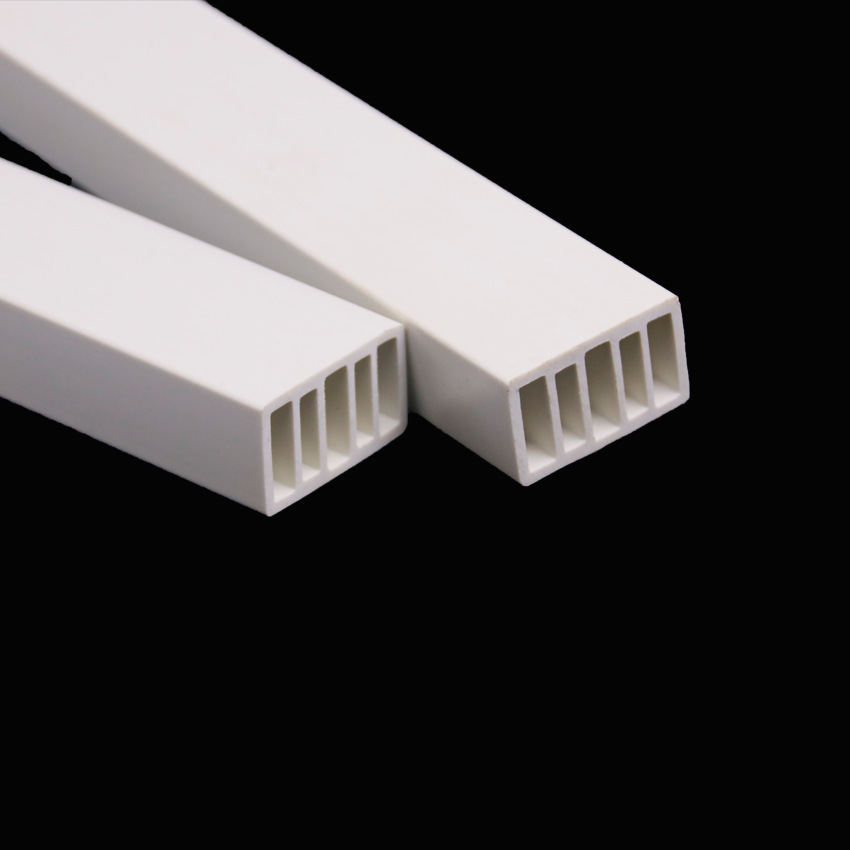 Perfiles de plástico extruidos, perfiles huecos de PVC, tubos cuadrados de PVC de nueve orificios, tubos de plástico, según dibujos y muestras.