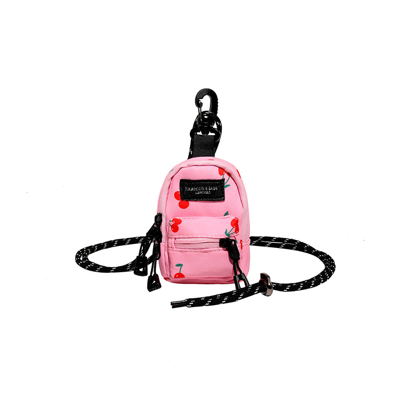 Mini lápiz labial auricular bolsa pequeña 2024 nueva tendencia moda colgante bolso de tela de diseño de nicho bolso de mensajero de un solo hombro