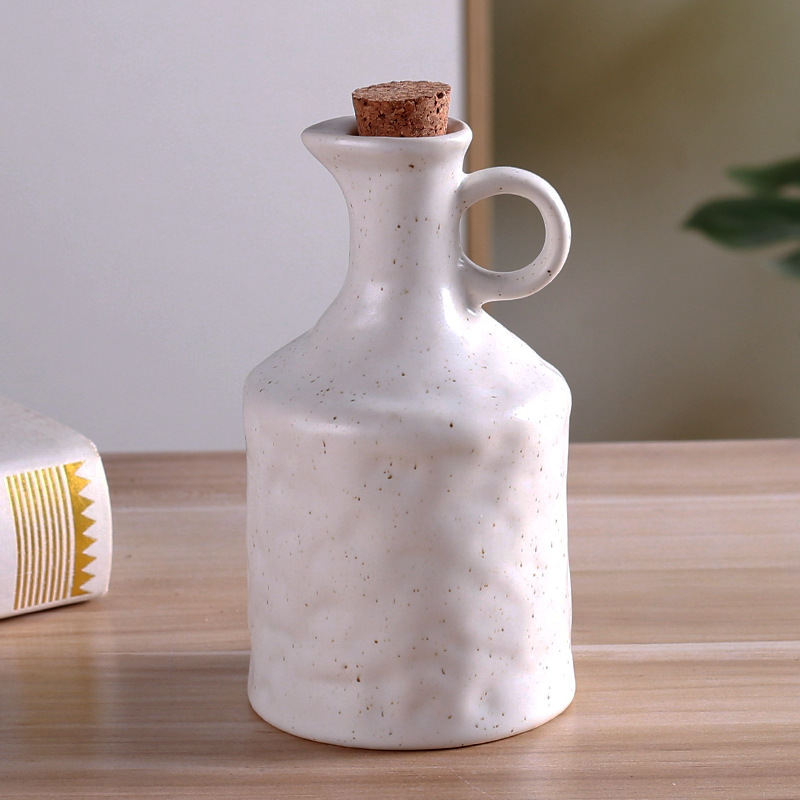 Cocina europea especial hervidor de aceite sin colgar aceite de cerámica doméstica creativa mano de la textura cerámica tapa de botella de aceite a prueba de fugas
