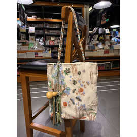 新中式国风刺绣通勤包女2025新款花朵帆布手提包大容量单肩托特包