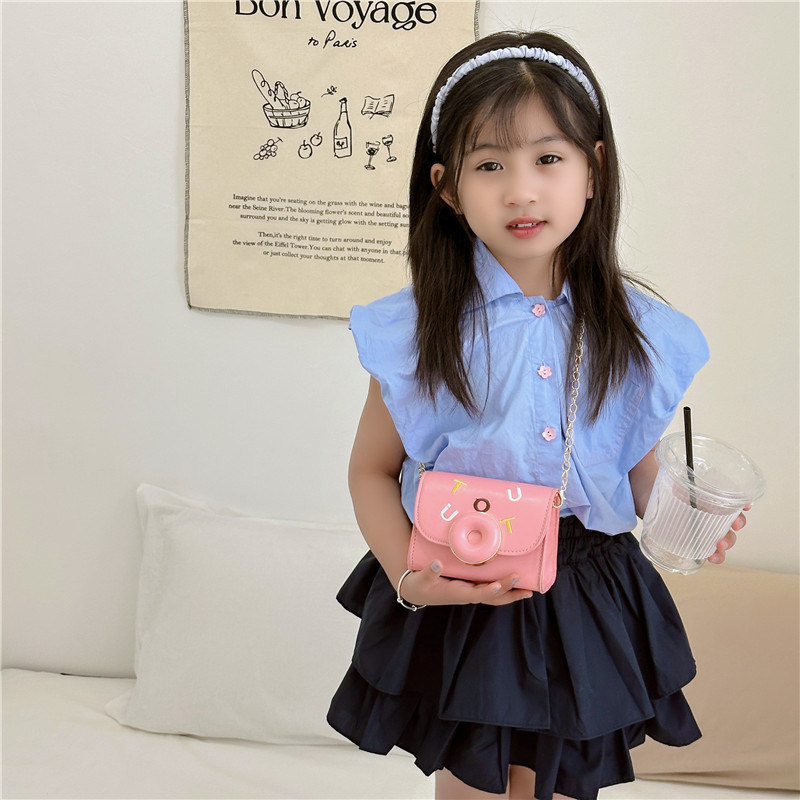 2025 otoño nuevo bolso de moda para niños color caramelo PU bolso de hombro para niñas bolso de cadena de hombro bolso de accesorios para bebés