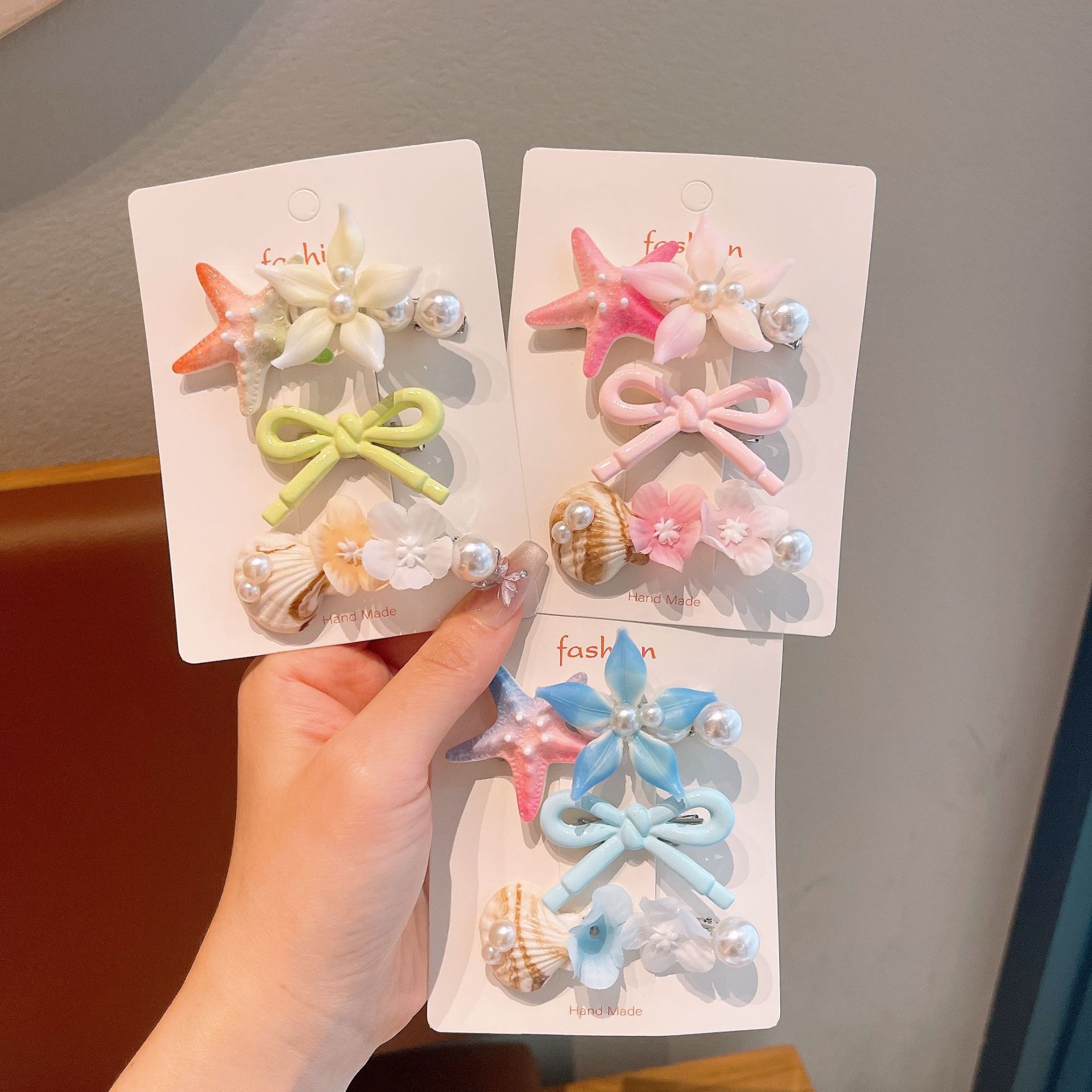 Nuevo adorable adornamiento para el cabello de niños estrella de mar conchas de perlas clips para el cabello de mujeres gradiente estereoscópico flores pequeñas toque de cabeza para niños