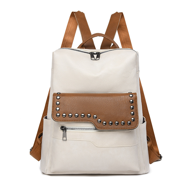 Venta directa de fábrica primavera nueva mochila de cuero suave para mujer de color sólido moda retro de gran capacidad mochila de viaje al aire libre