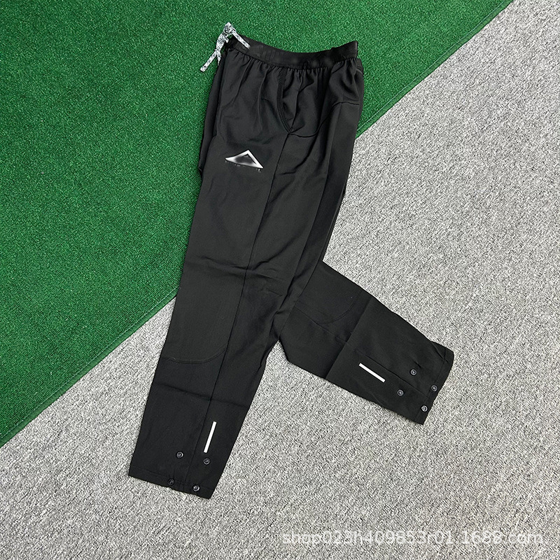 2025 nuevo transfronterizo de un tipo idéntico tres tecnología de prevención tela de secado rápido hombre al aire libre ocio deportivo pantalones respirables
