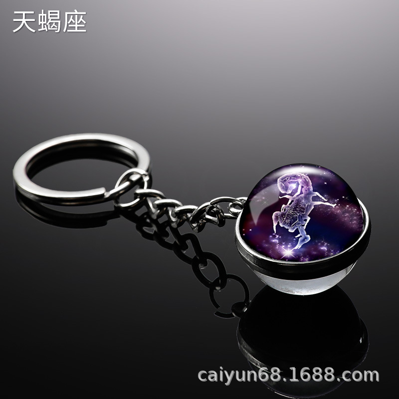 Transfronterizo 12 constelaciones de luz nocturna bolsos colgantes de bolsas de joyas de tiempo doble cara bola de vidrio llavero al por mayor