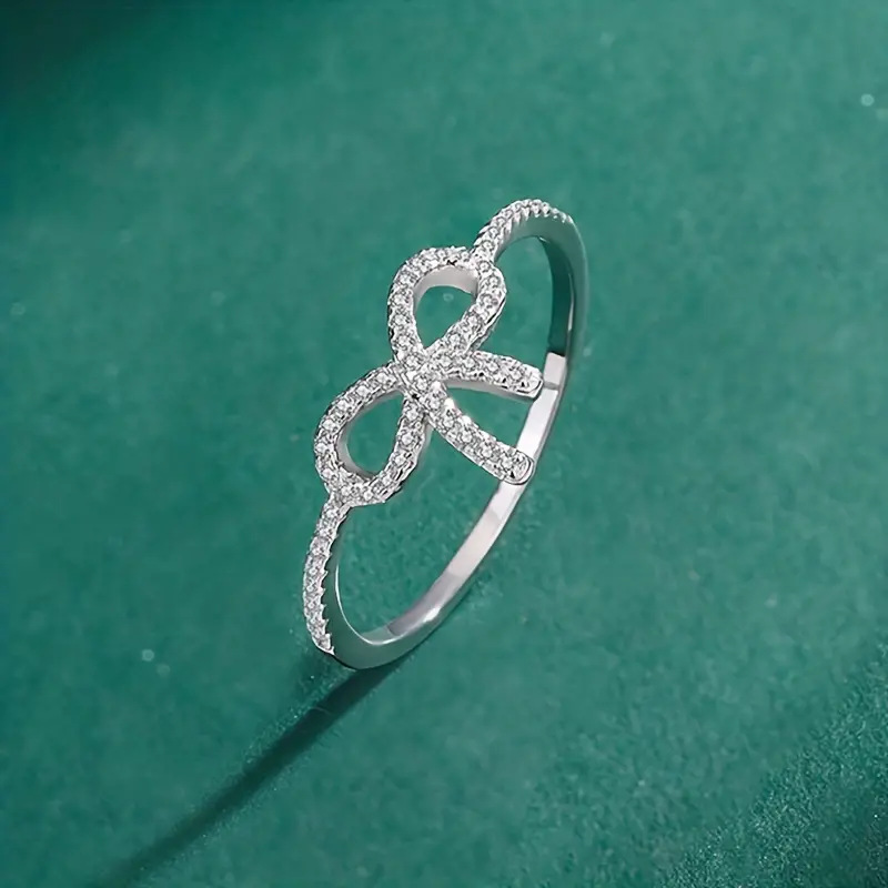 Wholesale IG Style Shiny Bow Knot Copper Hollow Out Inlay Zircon Rings display picture 7