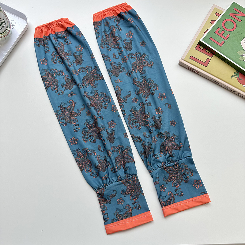 Mangas de protección solar para mujeres de verano nuevo estilo al aire libre anti-UV patrón de montar mangas de brazo de impresión de viento elegante