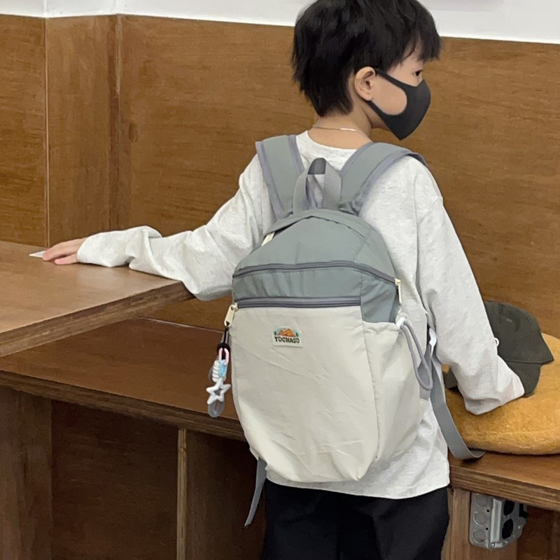 Mochila de estilo coreano para niños y niñas, mochila de estilo extranjero de gran capacidad para estudiantes de escuela primaria 2025 nueva mochila infantil