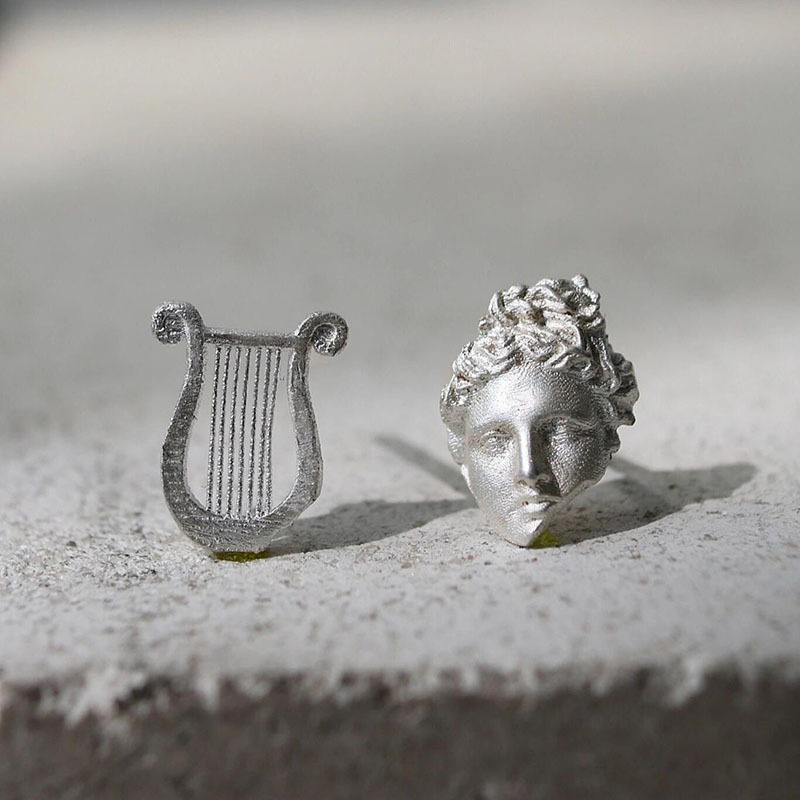 European and American minority designs are exquisite and high-grade, burning white Apollo and his lira asymmetric simple earrings. European and American minority designs are exquisite and high-grade, burning white Apollo and his lira asymmetric simple earrings.
