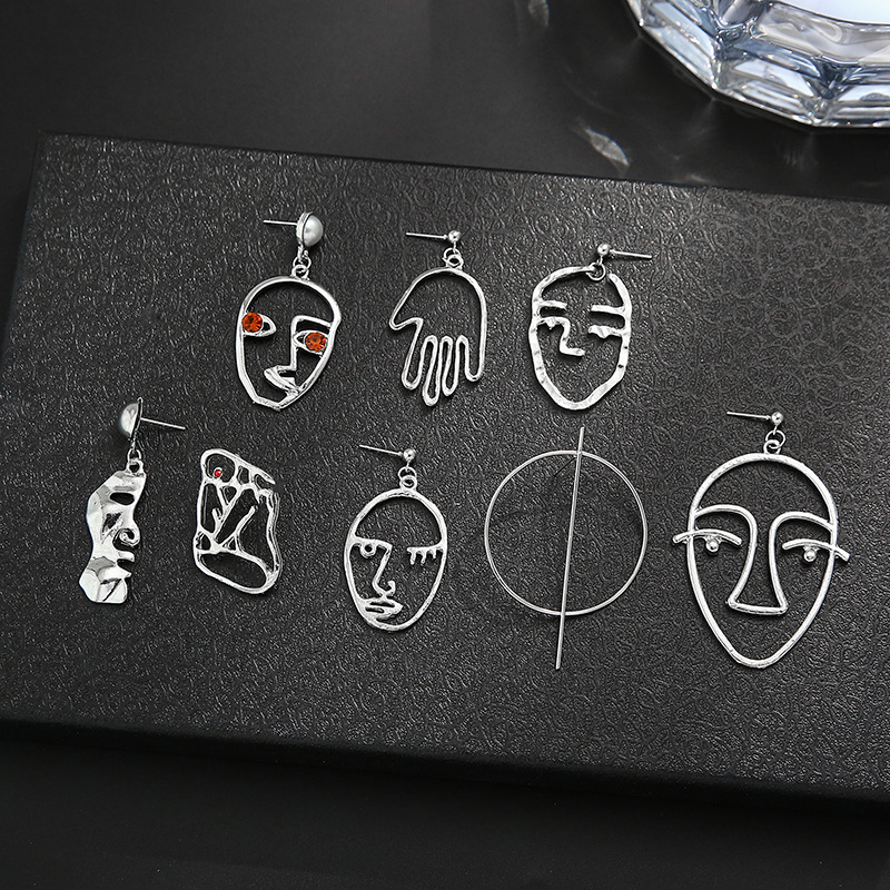 Fashion Creative Hollow Portrait Alloy Drop Earrings Set display picture 2