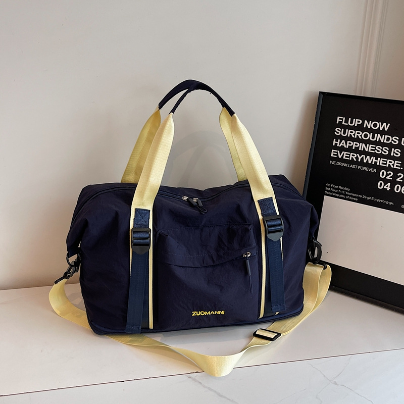 Bolsas de viaje al por mayor estilo empalme contraste de alto valor de equipaje expansión de gran capacidad bolsas de yoga deportivas bolsas