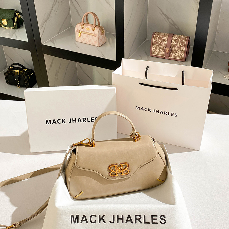 Una bolsa de silla de lujo ligera de nicho 2024 nueva bolsa de mano retro de alta calidad al por mayor