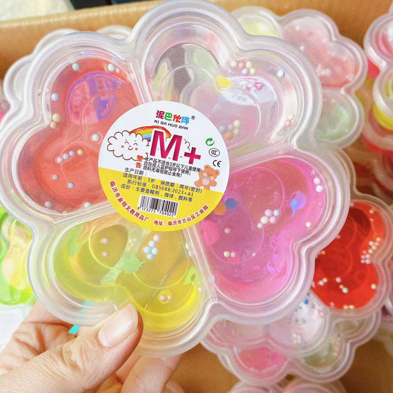 Nueva melocotón en forma de corazón de cristal de barro Trébol de alta permeabilidad pegamento espumante 4 Rejilla 4 Color de descompresión DIY Delgado fábrica al por mayor