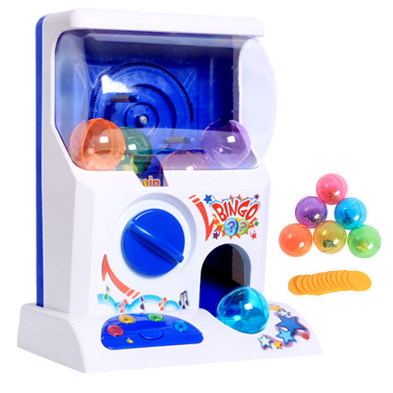 Mini máquina de torsión de huevos para niños transfronterizos pequeño juguete para niños domésticos agarrando música Moneda de caramelo regalo máquina de juego