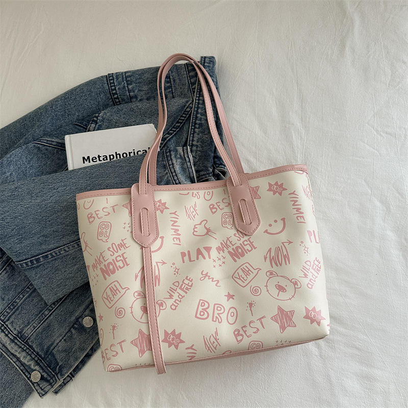 Bolsa de hombro de gran capacidad para mujeres, bolso de alta calidad, bolso grande, 2024 nuevo estilo de moda, bolso de clase de graffiti