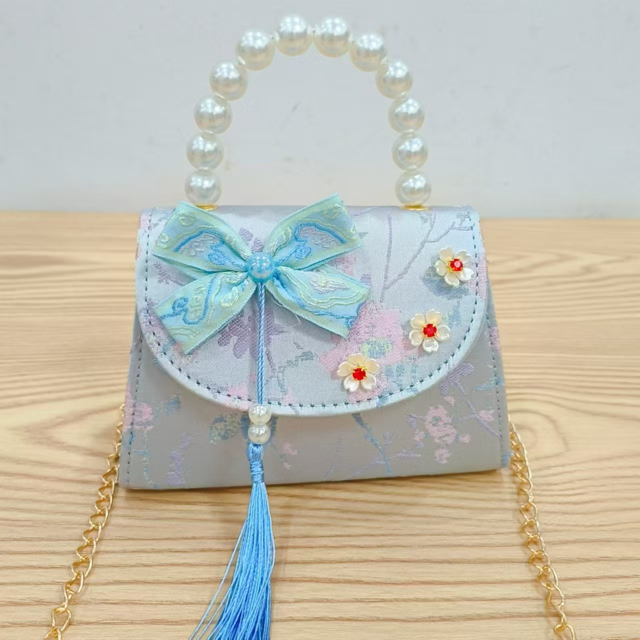 Bolsas de niños arco de estilo chino bordilla accesorios de niñas bolsas de mano princesa de perlas bolsa de cambio