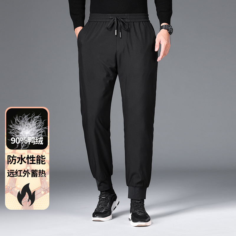 Men's drawstring thick down trousers, new winter 2025 style, mid-aged business casual, warm, wrinkle-resistant, and tapered leg trousers.