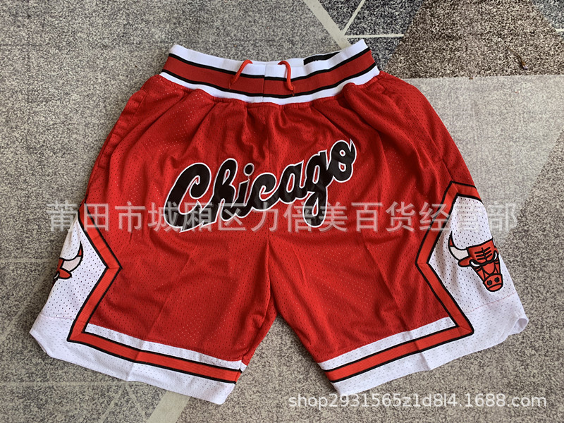 Comercio exterior pantalones de fútbol al por mayor Warriors Lakers 76 caliente Raptor mágico bolsillo bordado pantalones cortos pantalones de baloncesto NFL