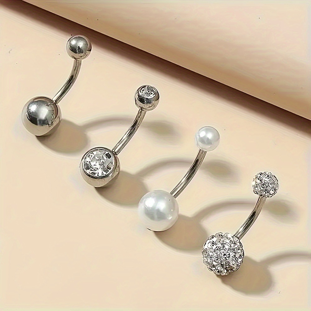 Set med 8 navelpiercingar i rostfritt stål med zirkonia_voghion.com