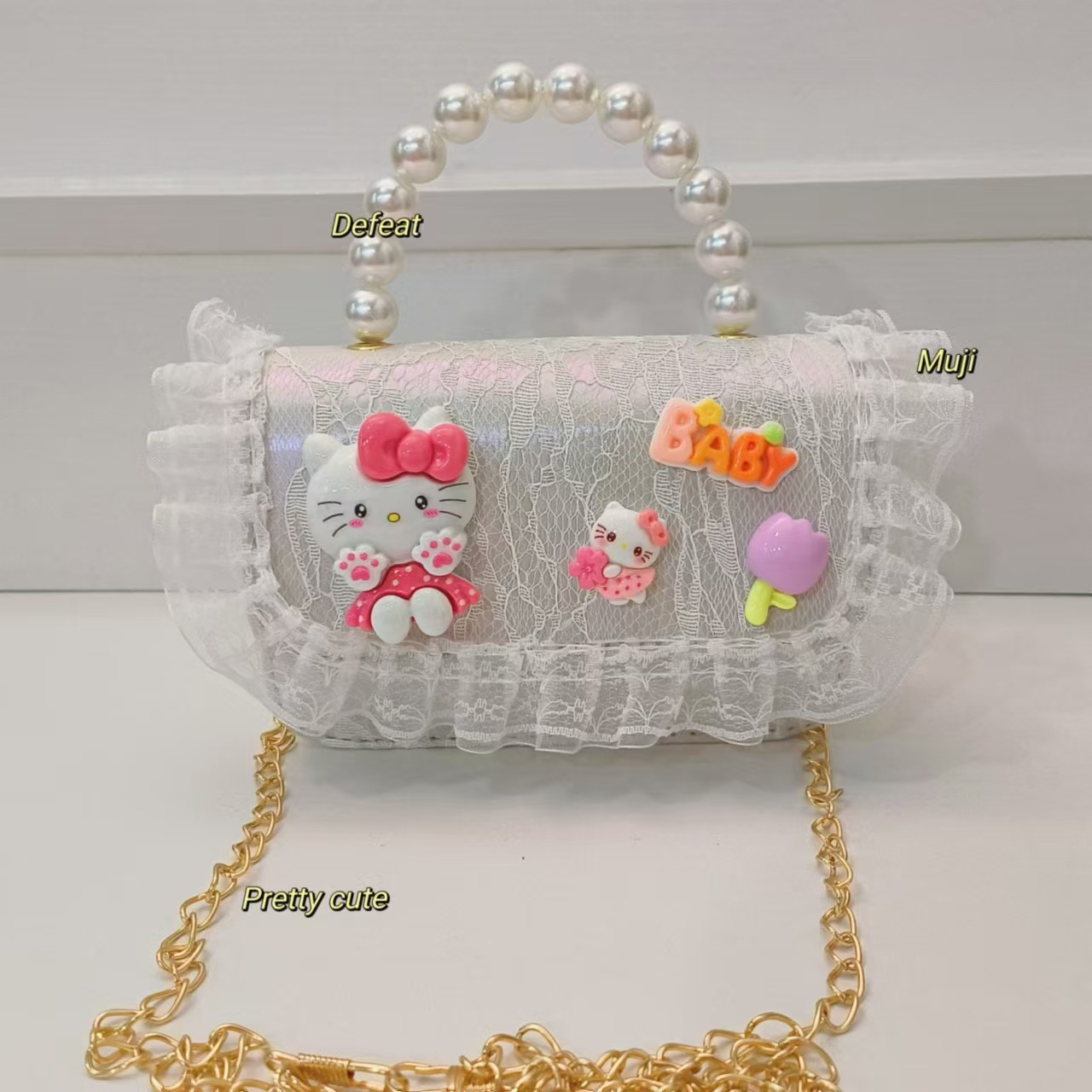 Cartoon KT feline bolso bolso de perla bolso de hombro mochila bolso de cambio bolso de cadena bolso pequeño bolso cuadrado bolso para niños