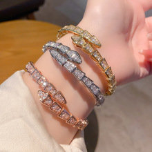 厂家直销厚金弹簧满钻蛇形手镯女18玫瑰金开口首饰蛇骨手环秒代发